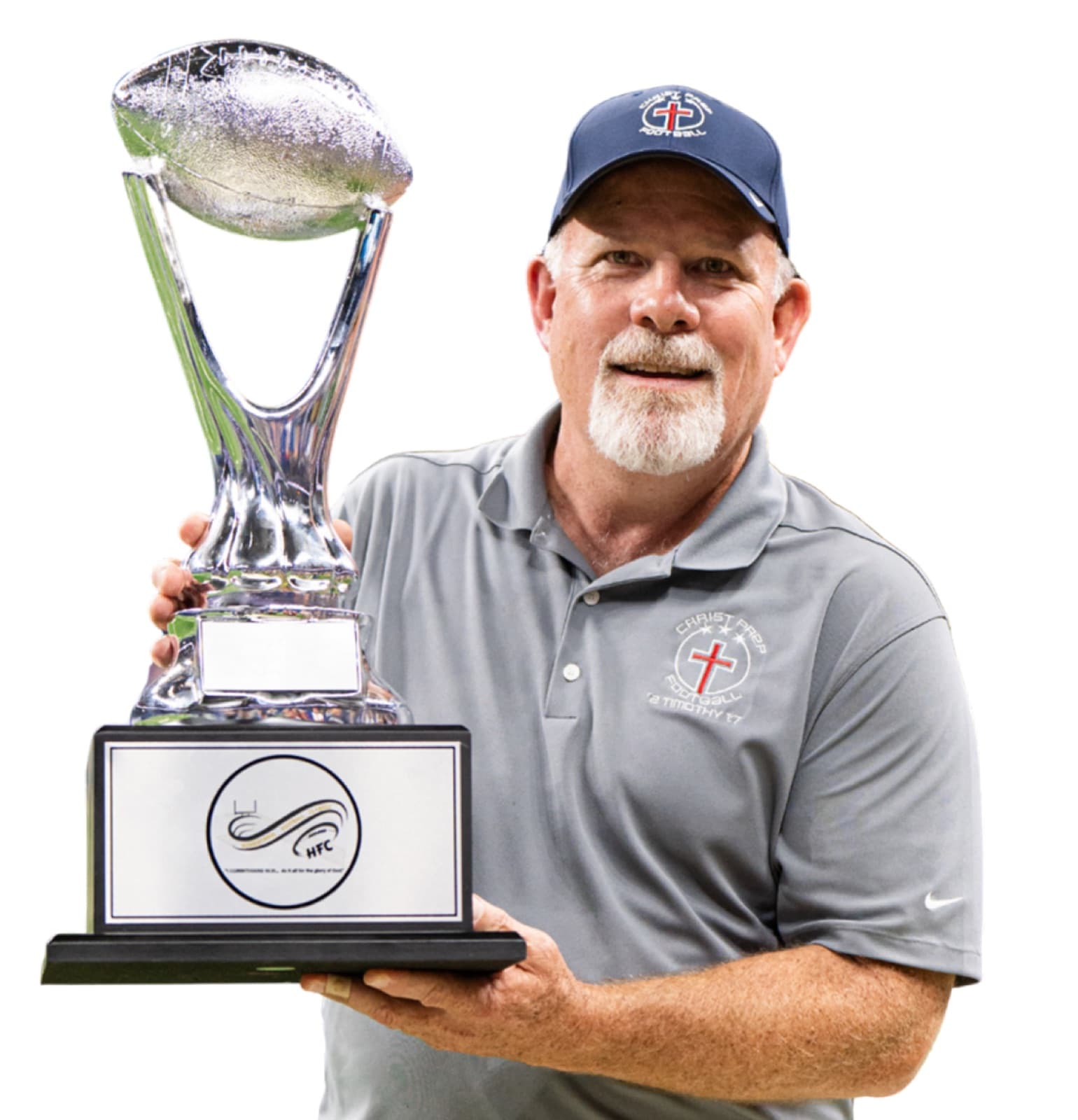 Christ Prep coach with trophy